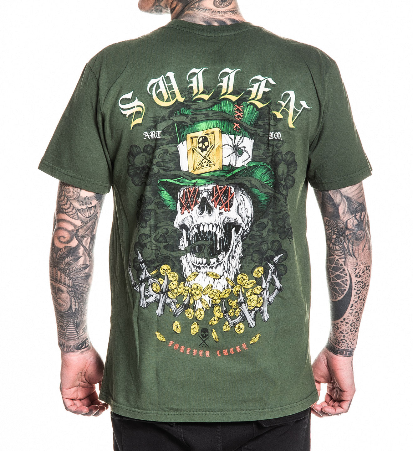 Green t-shirt with a skull design and 'Sullen' branding worn by a person.