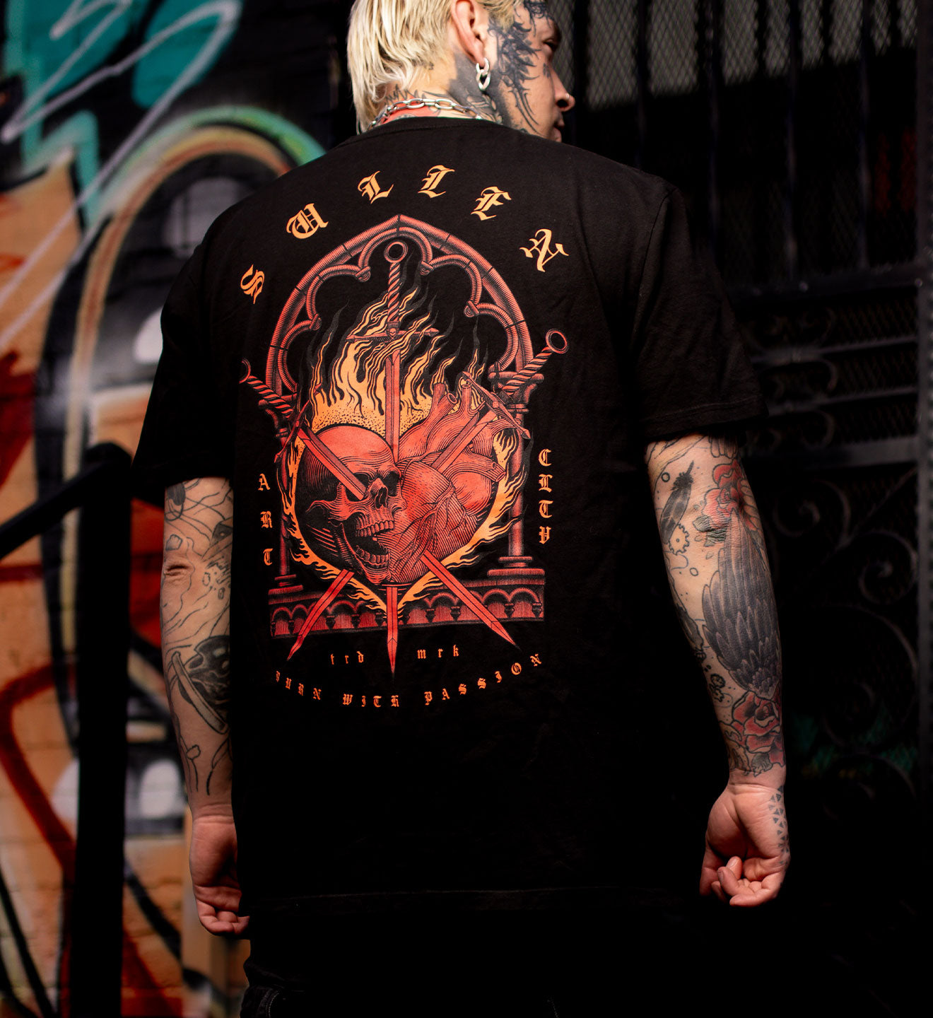 BLACK SULLEN T SHIRT WITH FLAMING SACRED HEART PIERCED WITH KNIVES IN A CATHEDRAL WINDOW FRAME