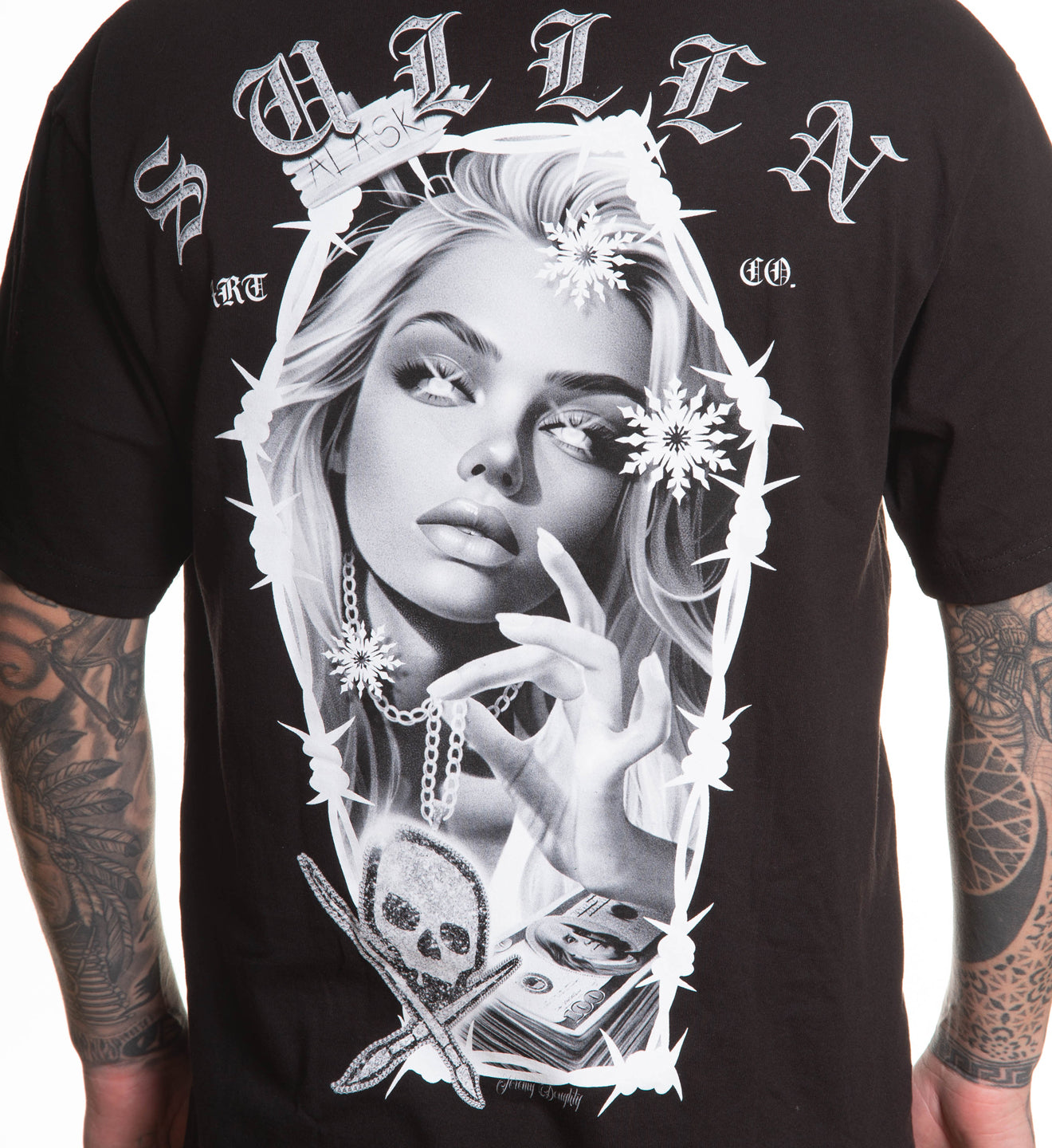 Black t-shirt with a graphic design of a woman's face, barbed wire, and text on a white background.