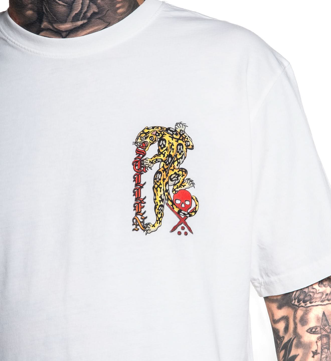 White t-shirt with a colorful graphic design featuring a snake and skull on a plain background
