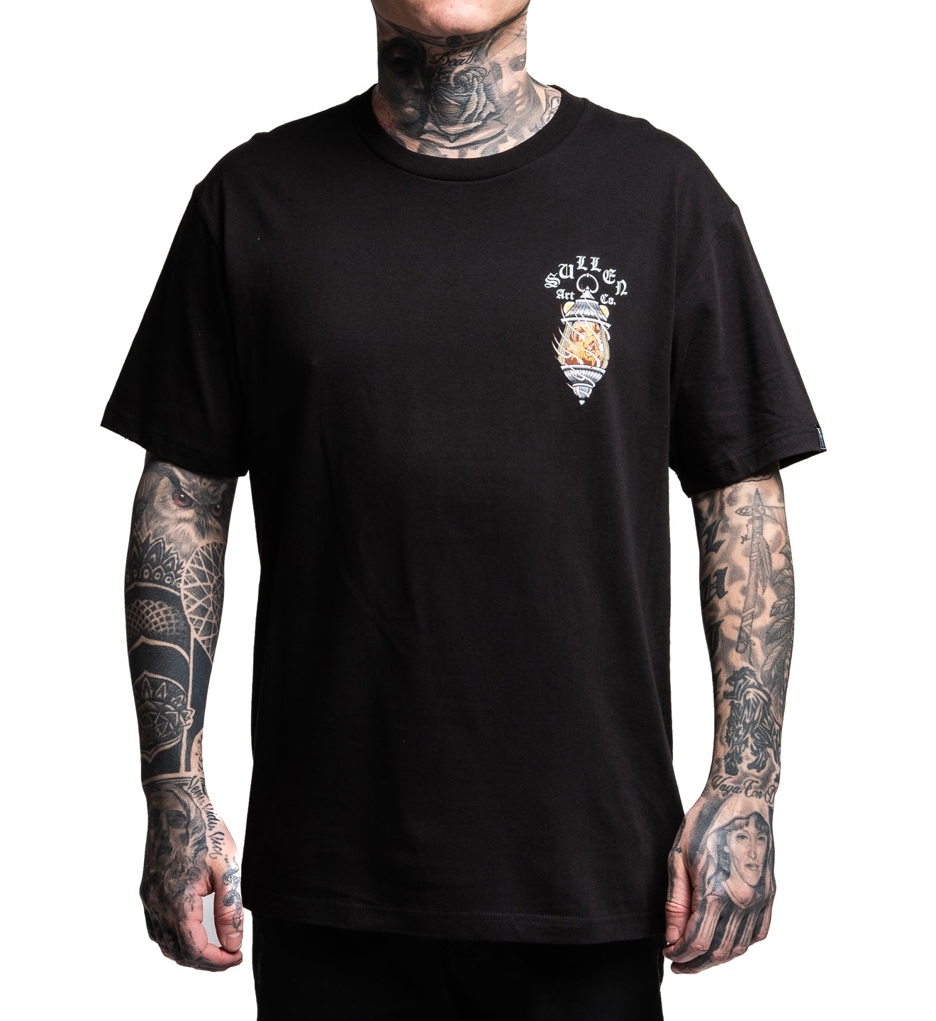 Person wearing a black t-shirt with a logo on a white background