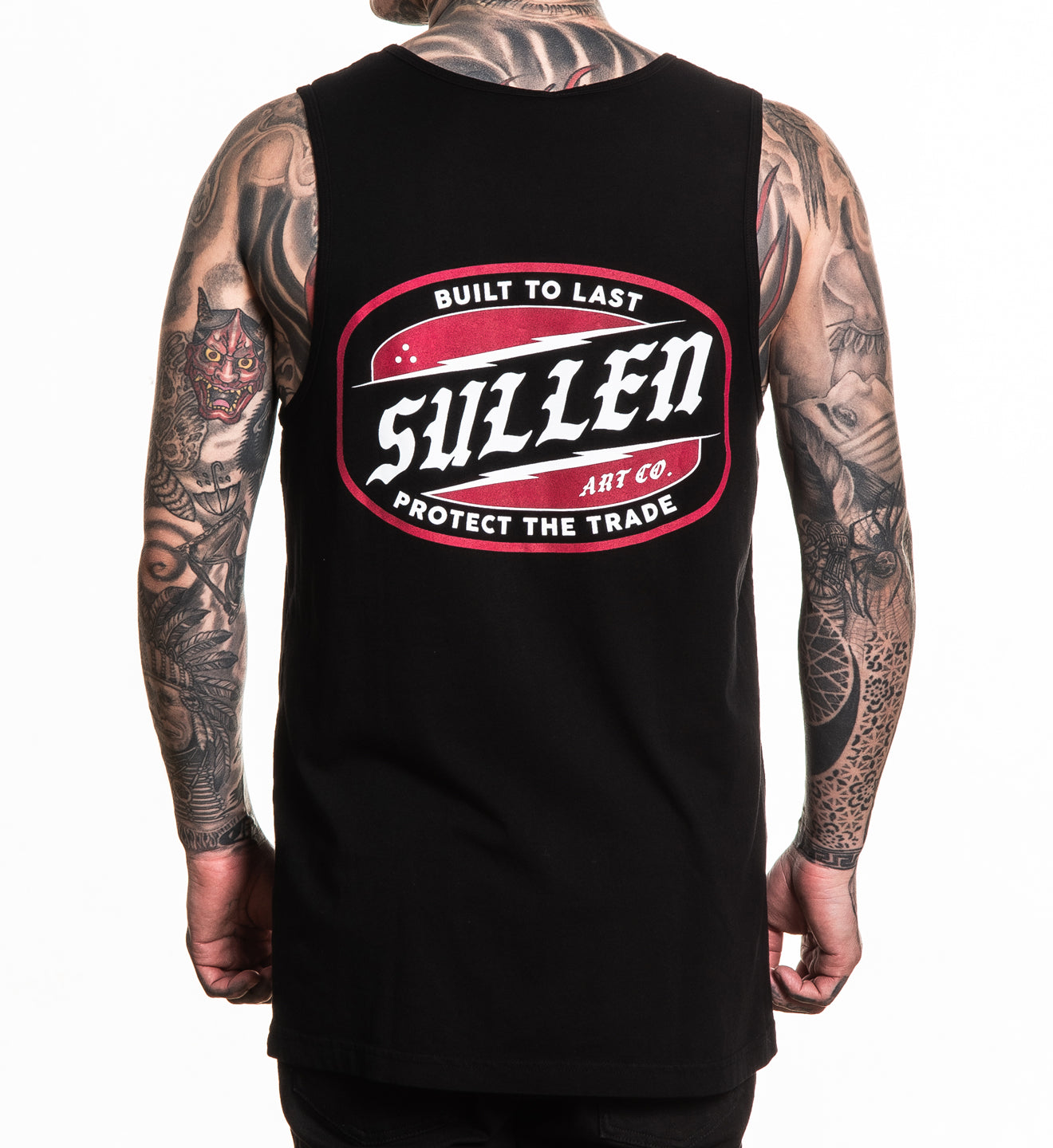 Person wearing a black tank top with Sullen logo and text