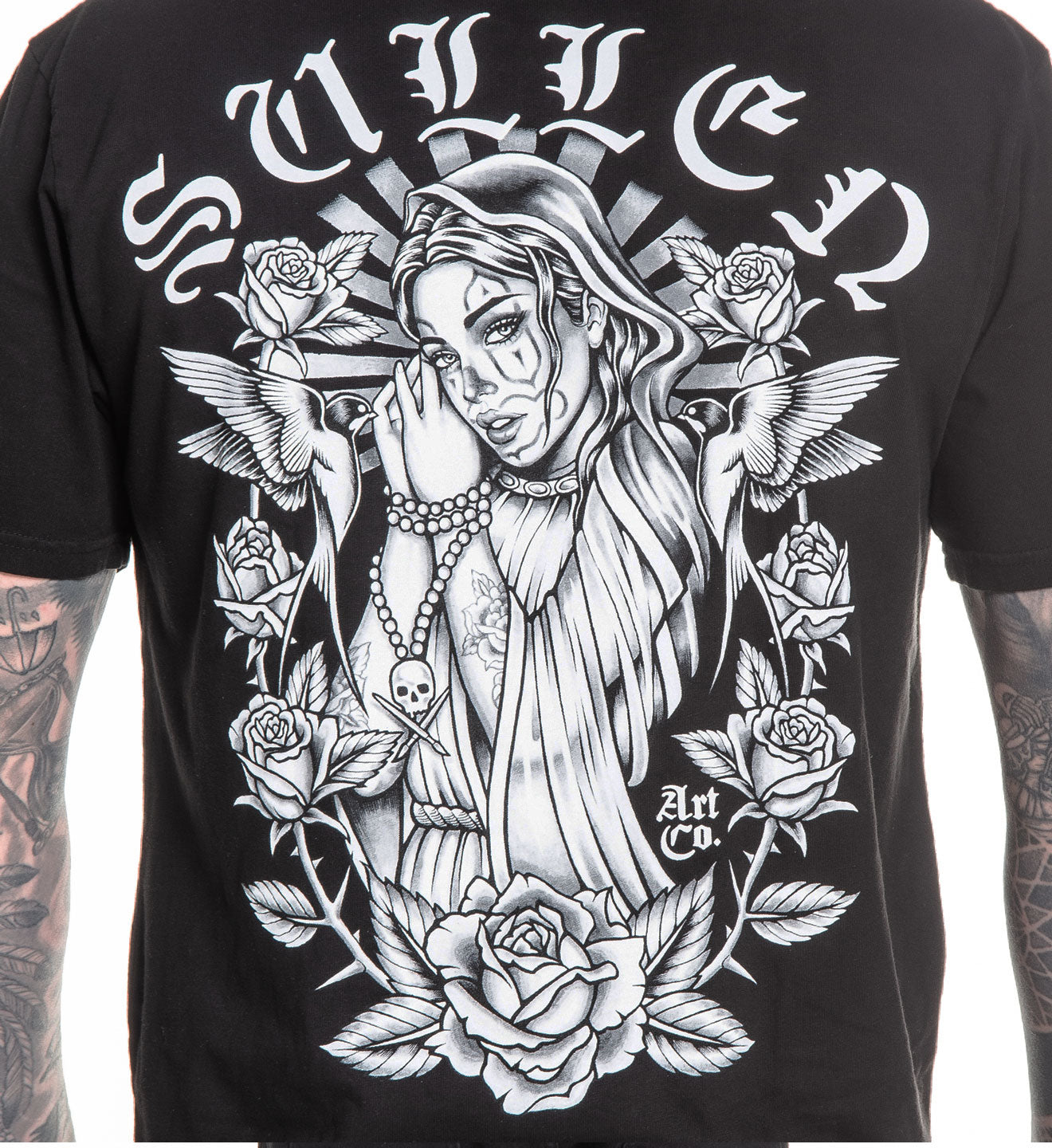 Black t-shirt with a graphic design of a woman, roses, and text on a plain background