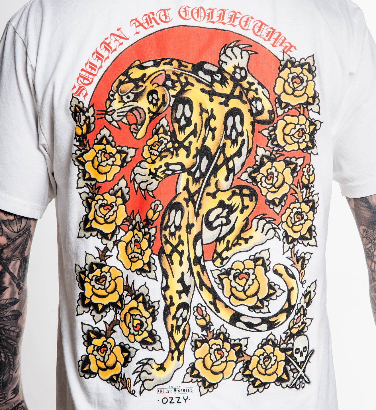 White t-shirt with a colorful graphic of a panther and flowers on a white background