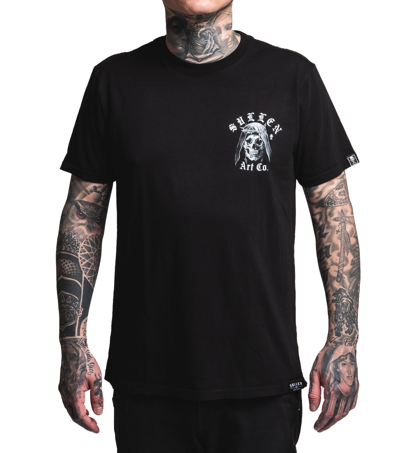 Person wearing a black t-shirt with a logo on a white background